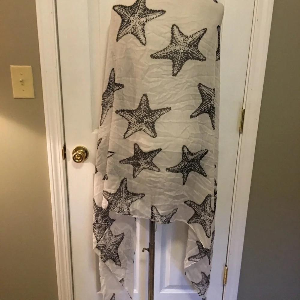 No brand name on this novelty scarf wrap. Is NWT. Sea star, starfish print.